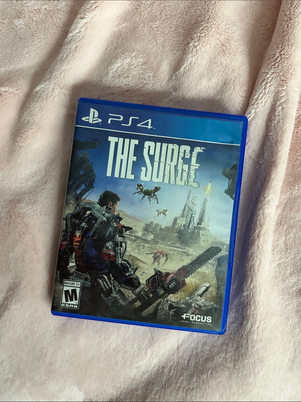 Sony PS4 The Surge - Blue Case with Black Disc